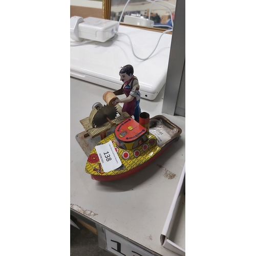 138 - 2 x tin toys