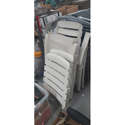 78 - 2 plastic  chairs