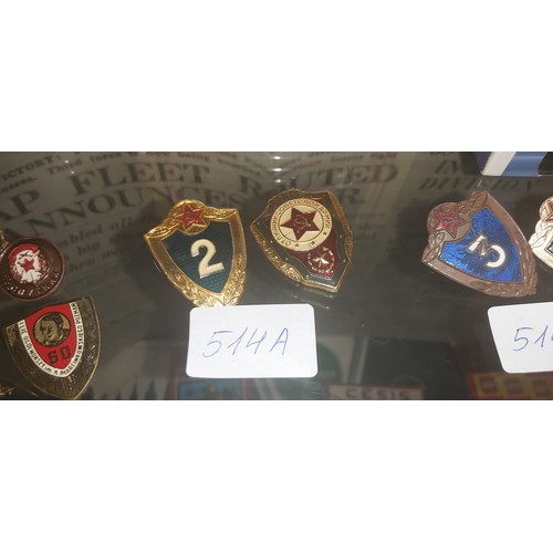 514A - Military badges