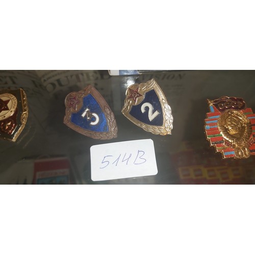 514B - Military badges