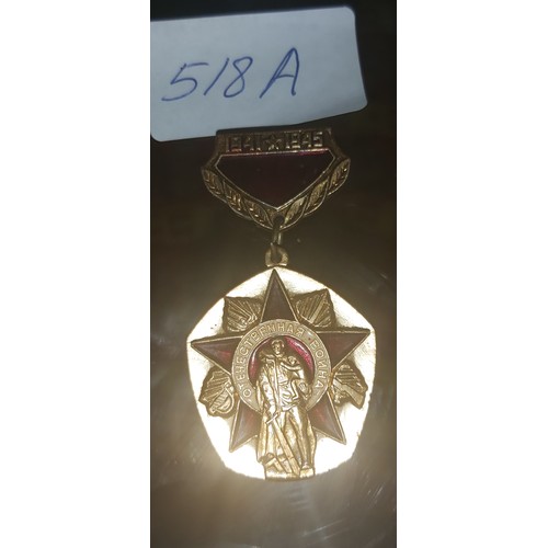 518A - Military badge