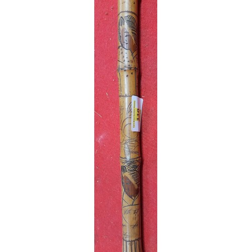 110 - Vintage Japanese carved bamboo sword cane with really nice carving of geishas and plants c1920s