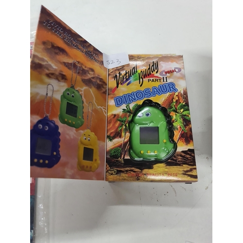 523 - 1997 Dinosaur original Tamagotchi