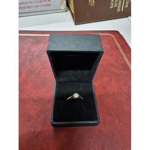 202A - 9ct gold .25pt diamond ring 2.2g