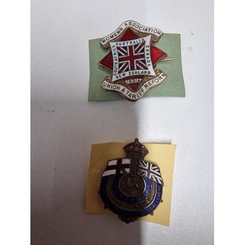 51A - Two Enamel badges