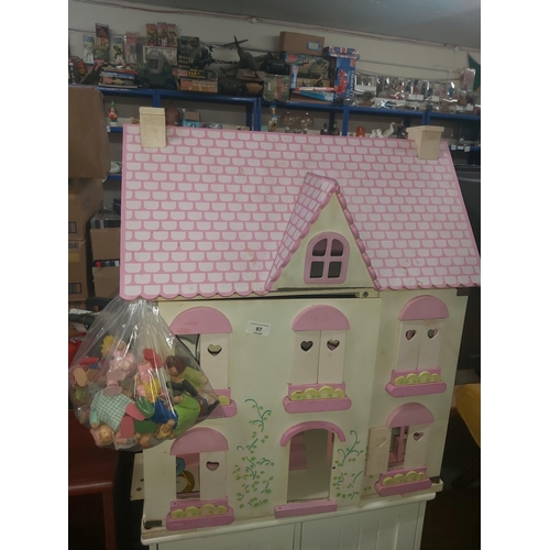 87 - dolls house with wooden accessories