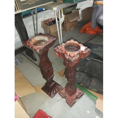 495 - 2 carved candle/plant stands