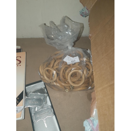 357 - bag approx 50 curtain rings