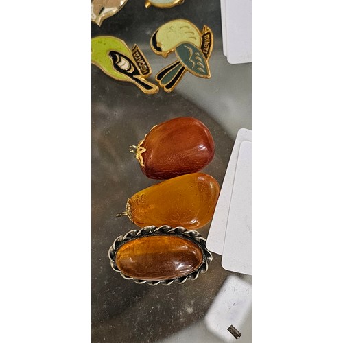 651 - 2 Amber pendants+brooch