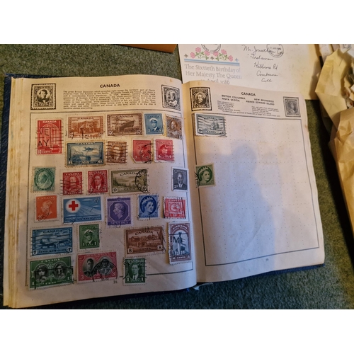 322 - Victory stamp album plus hundreds of stamps