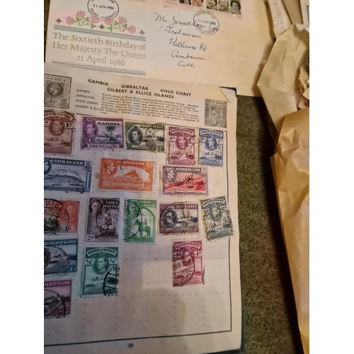 322 - Victory stamp album plus hundreds of stamps