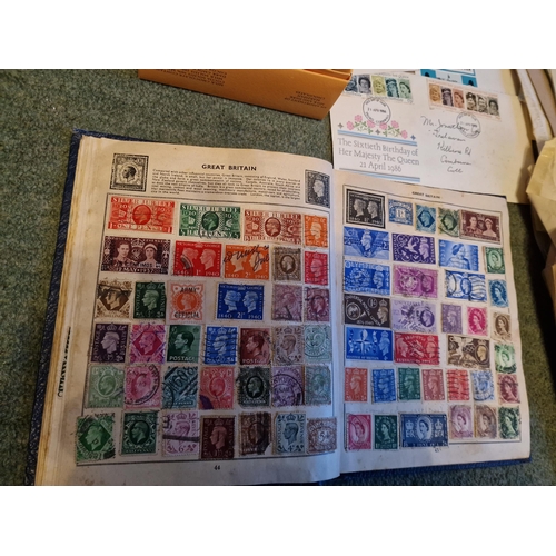 322 - Victory stamp album plus hundreds of stamps