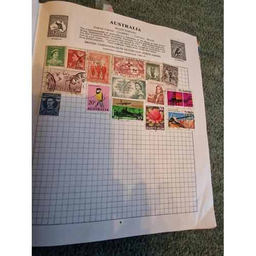 324 - Stanley Gibbons stamp album with loads of stamps