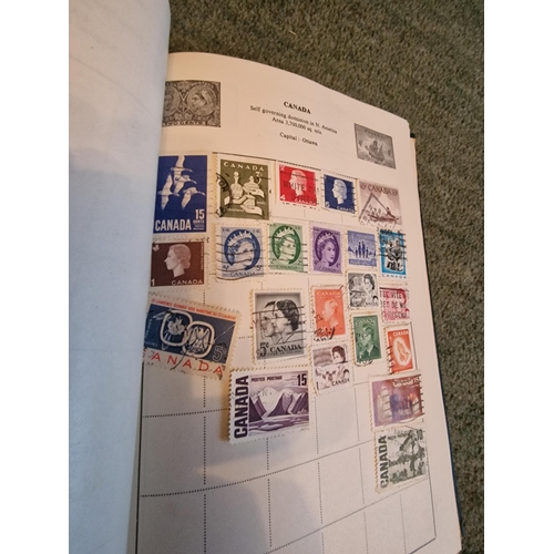 325 - Cardinal stamp album and stamps