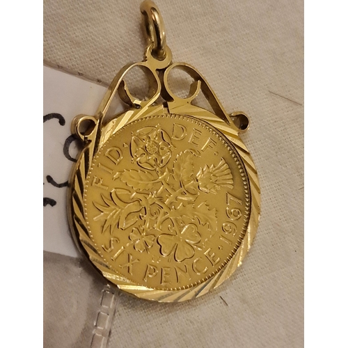 15 - 1967 gold on silver mounted pendant