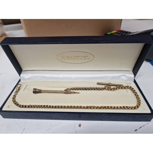 54A - 9ct gold propelling pencil unmarked tested. Has Metal top with stone and a gold plated fob chain