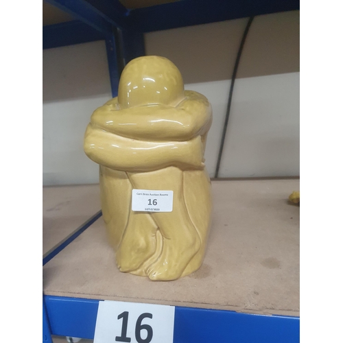 16 - art pottery of seated naked man