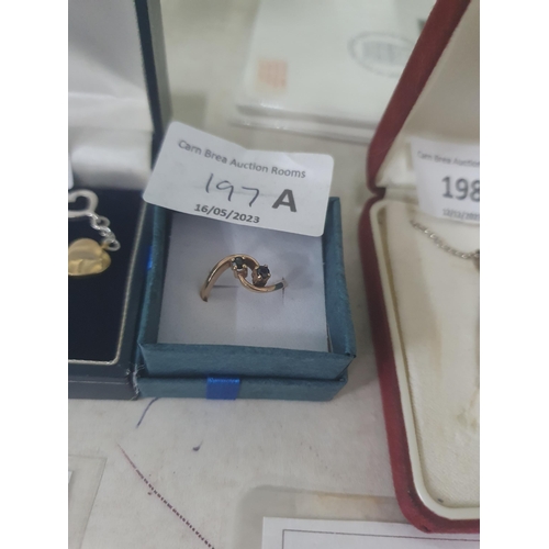 197A - 9ct gold sapphire twist ring size K½/L