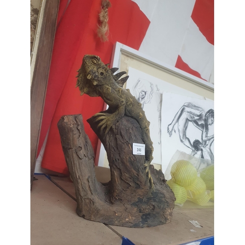 246 - large reptile on a log figure