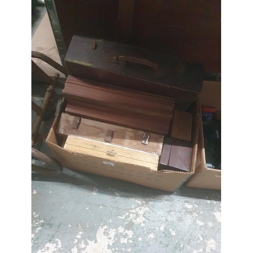 428 - box of wooden boxes