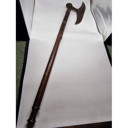 94 - A 19TH CENTURY INDO-PERSIAN FIGHTING AXE WITH 11