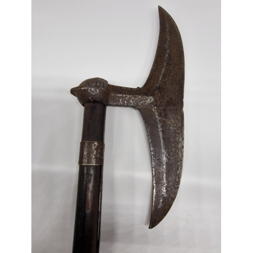 94 - A 19TH CENTURY INDO-PERSIAN FIGHTING AXE WITH 11