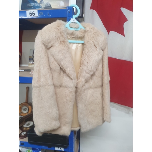 66 - fur jacket size 16