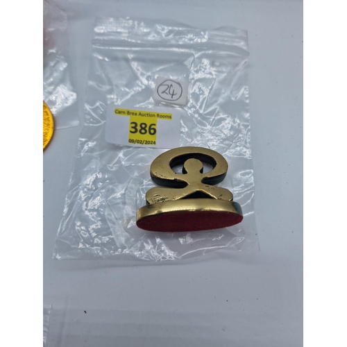 386 - Oriental brass paper weight