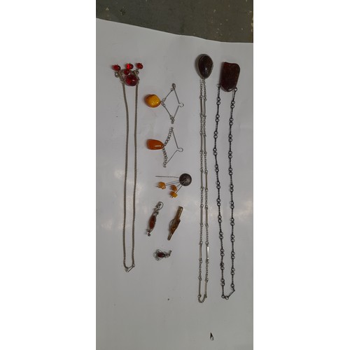 554 - Job lot of Amber jewellery