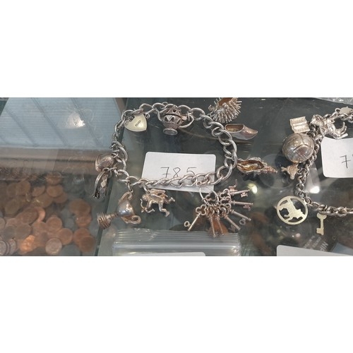 785 - Silver charm bracelet