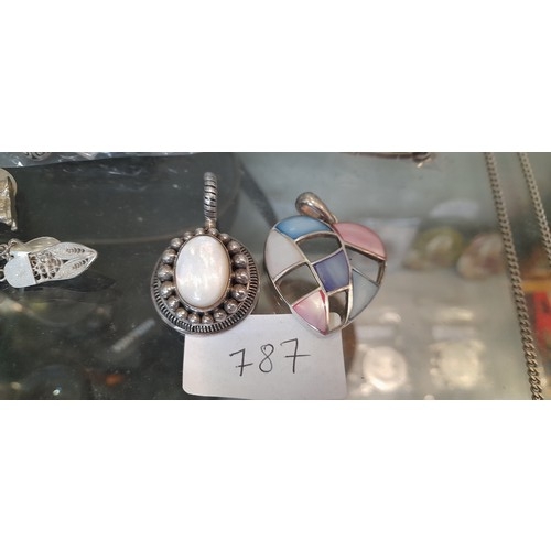 787 - 2 silver pendants