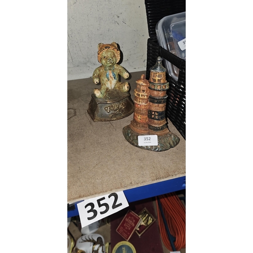 352 - vintage cast lighthouse doorstop & teddy doorstop