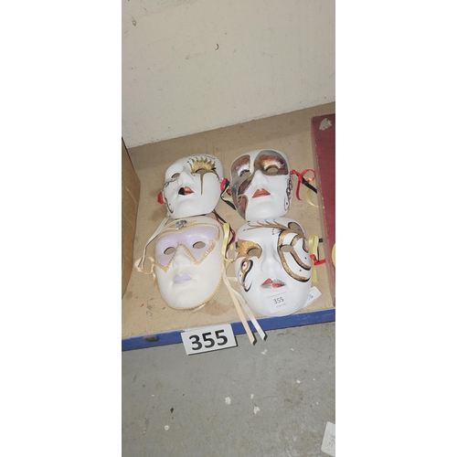 355 - 4 large ceramic assorted pattern face masks