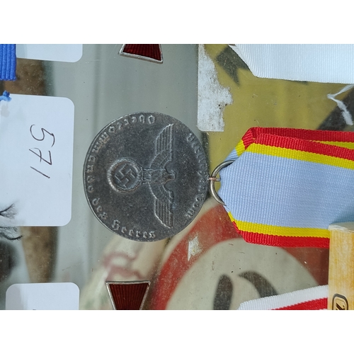 571 - German medal with svastik and eagle