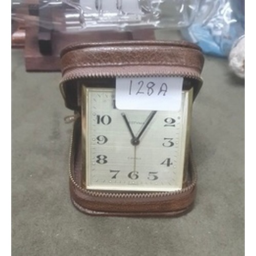 128A - VINTAGE ESTYMA LEATHER CASED TRAVEL CLOCK GOOD WORKING ORDER 
VERY GOOD CONDITION