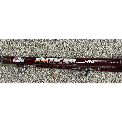 228 - ABU GARCIA ENTICER 2 PIECE BOAT PIER ROD - NEOTERIC REINFORCED GRAPHITE 
EXCELLENT CONDITION