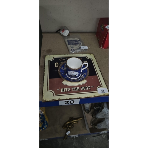 20 - tin sign & Britannia cup & saucer