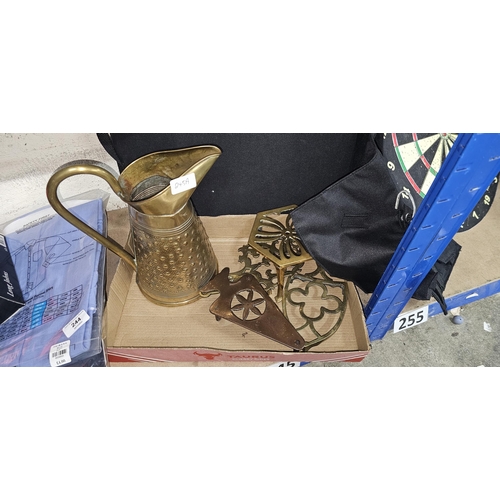 245A - 4 VARIOUS TRIVETS & BRASS JUG