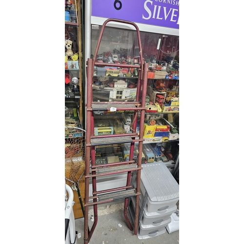 409 - METAL STEP LADDER DARK RED UNABLE TO POST