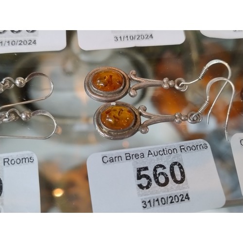 560 - Silver earrings with amber