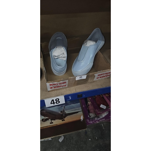 48 - pair of slip on shoes