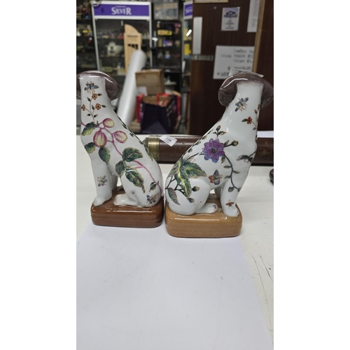 137 - Two Oriental dog figures