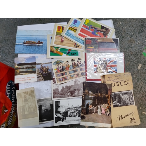 899 - Postcards, stamps and other ephemera