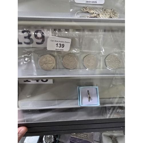 139 - STRIP OF 4 50P COINS