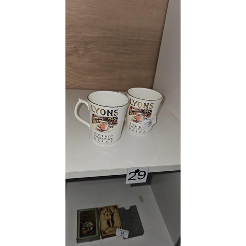 29 - Pair of Wade Lyons mugs