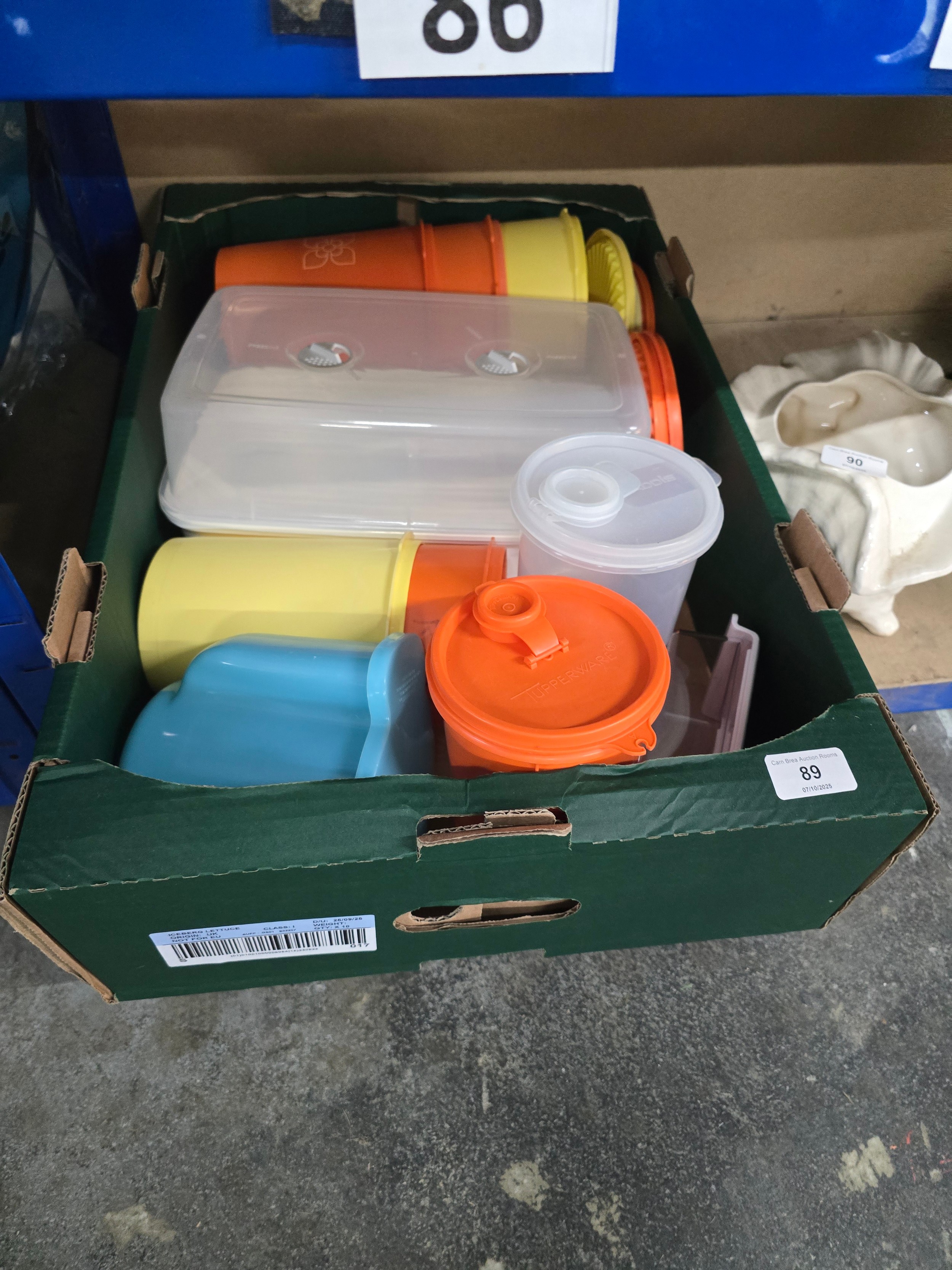 box of tupperware items etc