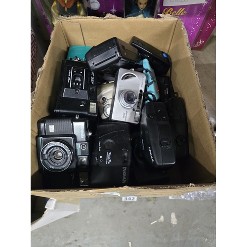 a box of vintage 35mm film cameras