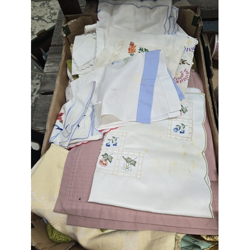 427 - A collection of vintage embroidered and decorative table linens, mid-20th century