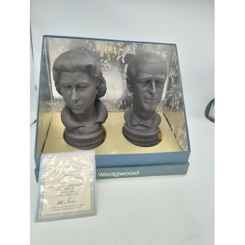 564 - Boxed pair of Wedgewood black basalt busts, celebrating the Royal Silver Wedding 1947-1972, busts of... 