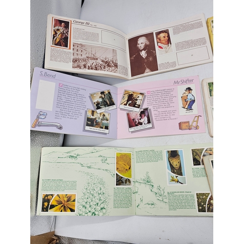 573 - Cigarette cards in albums